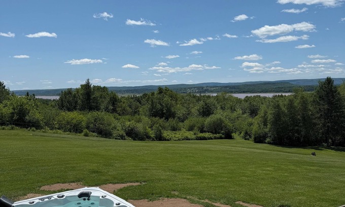 Memramcook House | Muddy River Retreat - Private backyard with Hot tub