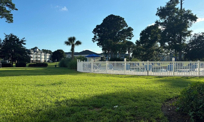 Central Myrtle Beach Condo | Myrtlewood 2-bedroom condo accepting pets. Pool in the backyard