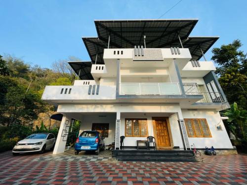 Anachal House | Nandana's Residency Munnar