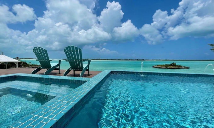 Hartswell House | New 5 BR Luxury Home with Dock, Pool, Spa & Beach on Moriah Harbour