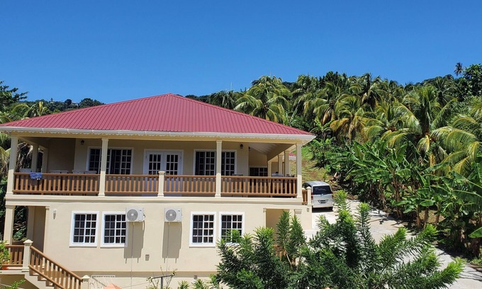 Moonhole Villa | New construction spacious villa with beautiful sunset view quick ride to beach!