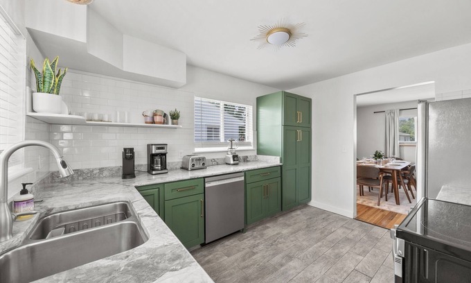Grove City House | NEW LISTING. 3BR house in Grove City w/Game Room, Chef Kitchen, Fire Pit