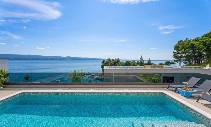 Omis Villa | NEW! Luxury, seafront Villa IVAN with heated pool only 100m from beach