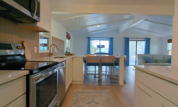 Cocoa House | Newly renovated home with air hockey, games, huge TV wall,fenced yard+screenroom