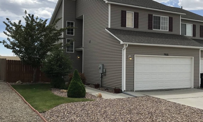 Rock Springs House | Nice, quiet townhouse with garage. Nicely landscaped and fenced in backyard.