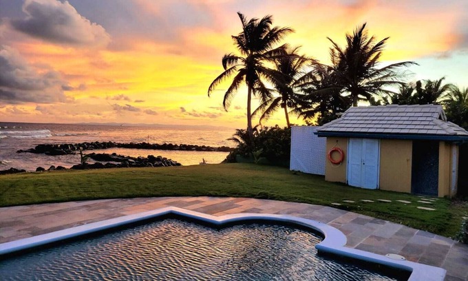 Lowlands Villa | Ocean front luxury villa in gated golf course community with private beach.