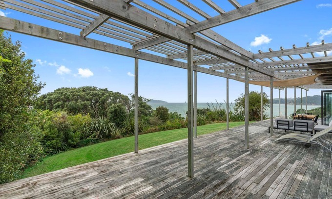 Langs Beach House | Oceanview Sanctuary - Modern, sunny holiday home with extensive decks and stunning views over Bream Bay