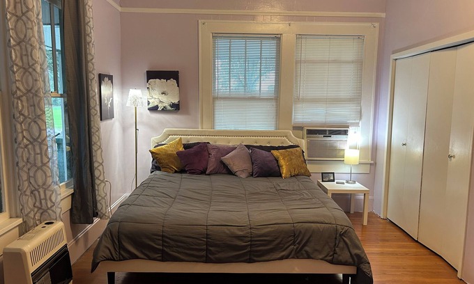 Saint Maurice Bed & Breakfast | Old farmhouse near Natchitoches. downstairs king bed shared bathroom