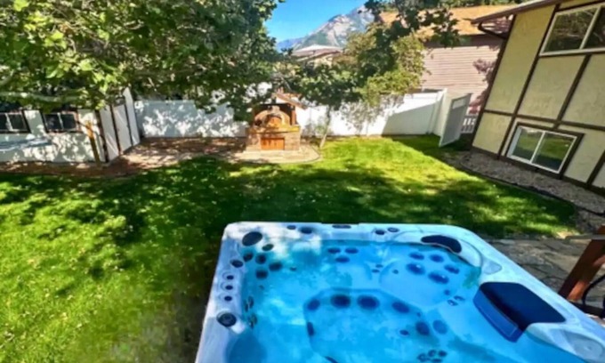 Sandy House | Outdoor enthusiasts and relaxation seekers. Enjoy our private hot tub and in-house ping pong