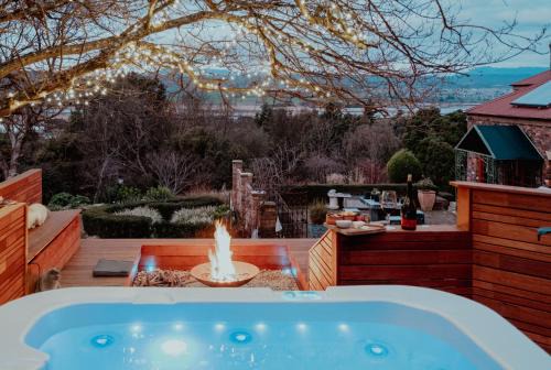 Riverside House | Outdoor Spa & Sauna with amazing views at Jaclyn Studio