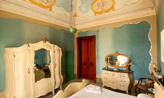 Calimera Apartment | Palazzo Sabella Tommasi white suite