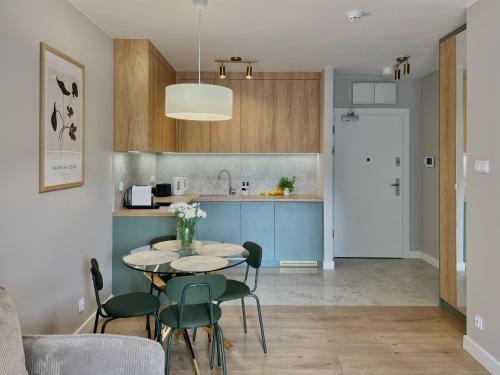 Dzielnica Uzdrowiskowa Apartment | PALM TREE Perłowa Przystań parking, 650m do plaży, świeżo oddany nowoczesny apartament, Parkplatz im Preis inbegriffen, 650 Meter zum Strand, frisch fertiggestellt, geräumige und moderne Wohnung, Parking included, 650 meters to the beach!