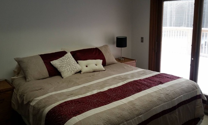 Norton Shores Apartment | Paradise Cove Lighthouse 2 br 1 bath on storage pond ~ sleeps 6