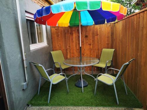 Hamilton House | Patio privé, hébergement équipé et spacieux.
