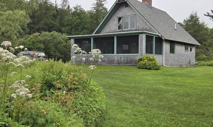 Owls Head Cabin | Peaceful coastal cabin with screened porch views of the cove, meadow, and sea