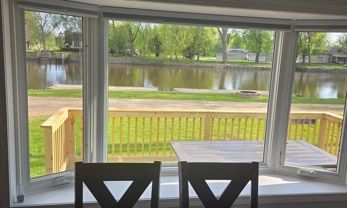 Omro House | Peaceful Riverfront - all amenities for fishing or friends/family getaway!