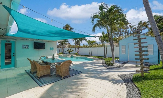 Deerfield Beach House | Pet friendly house with a heated pool and hot tub!