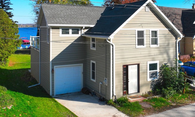 Pewaukee House | Pewaukee Lake Home, w/Dock, Gas Grill, Large Deck, near Boat Launch & Town