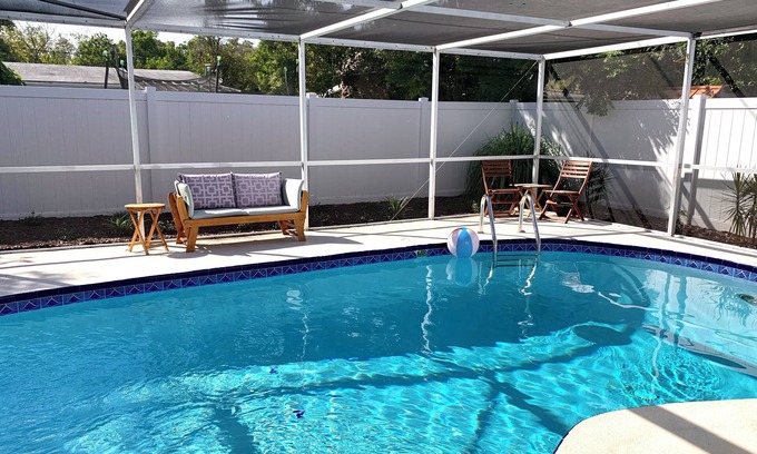 New Port Richey House | Private Fenced Backyard Oasis w/Pool, Firepit & Patio-3 King Beds & 3 Full Bath