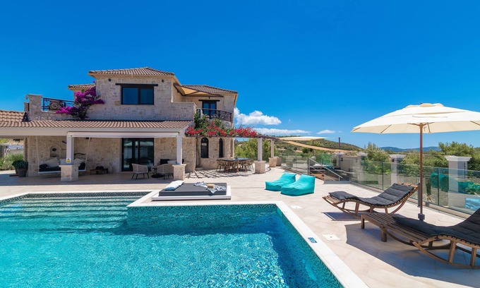 Agia Marina Villa | Private stone villa with heated pool & large outside area, set alone on hillside