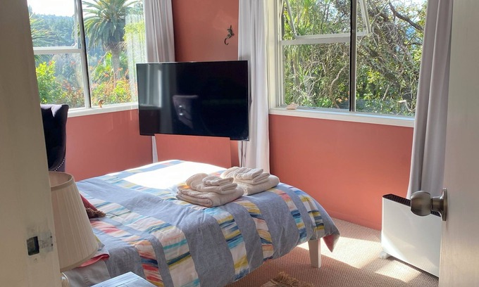 Woodhill Apartment | Private studio with your own waterfall garden and 5 minute walk to Hospital