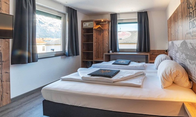 Pradl Hotel | Quadruple Room with Shower, Toilet - BinderS Budget City-Mountain Hotel