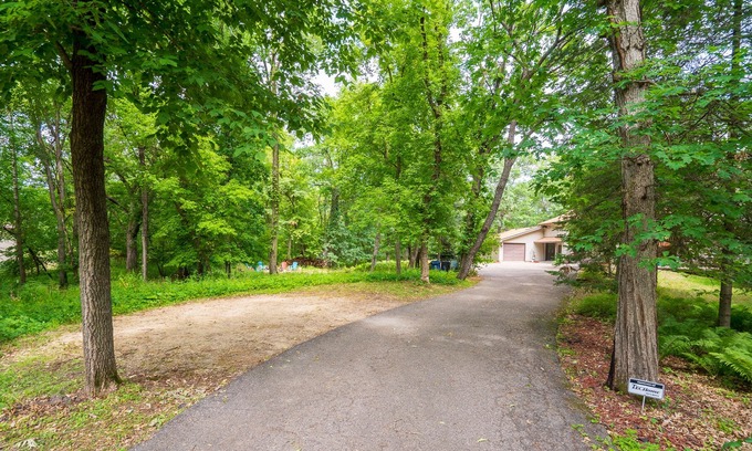Webster House | Quaint Urban Cottage/Guest House on 3 acre wooded lot over looking a pond.