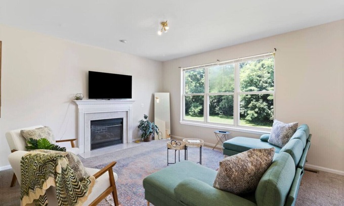 Mitchell House | Quiet Suburban Home with Cozy 70's Art-Deco Flair
