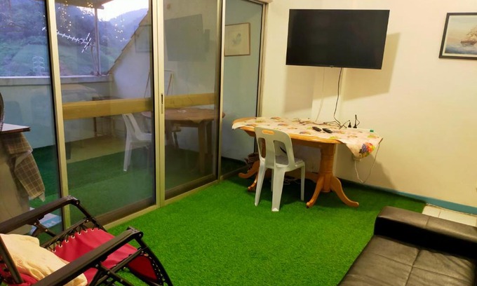 Bukit Tinggi House | R2L5Y Room 1 with balcony and bathroom
