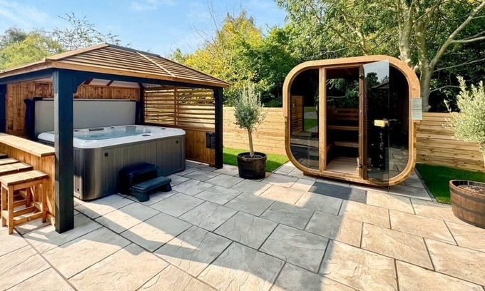 Raywell Ski Chalet | Recently upgraded with Gazebo over hot tub and side bar with stools.