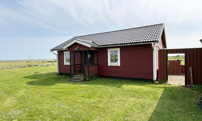 Alby House | Red cozy cottage with sea view | SE04035