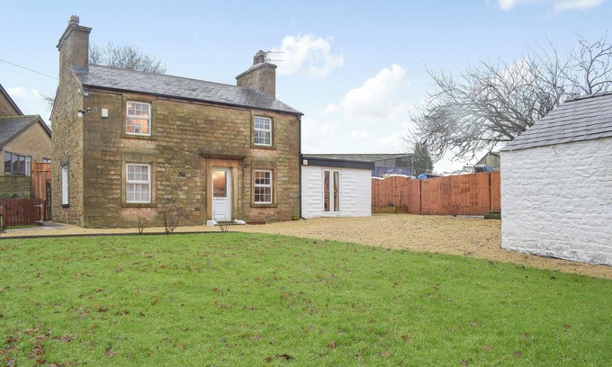Knott End-on-Sea Cottage | Relax by the stream in the garden or visit the historic city of Lancaster.