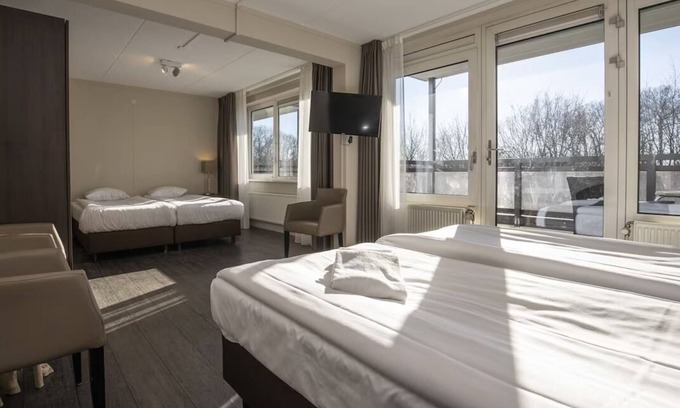 Ellecom Hotel | Relax in Luxury: Comfortable Room with Garden Views in Ellecom