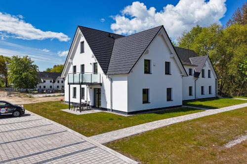 Lobbe Apartment | Rex Rugia FeWo15-3 mit Schwimmbad und Saunanutzung im AHOI-Erlebnisbad Sellin