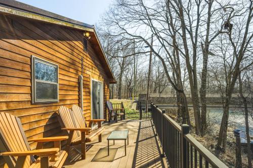Covington House | Riverfront Covington Cabin with Deck and Fire Pit!