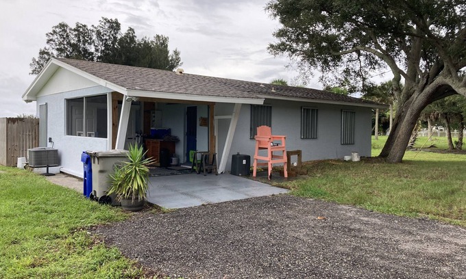 Sebastian Cottage | Riverfront home with a boat dock, WiFi, AC