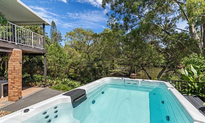 Elanora House | Riverfront Oasis in Elanora