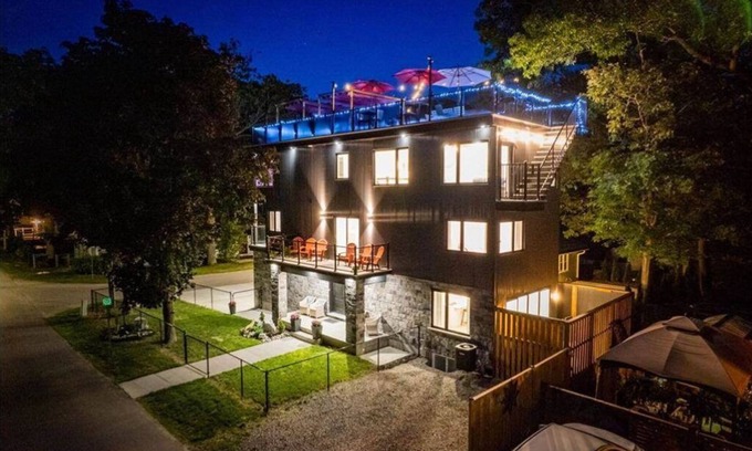 Grand Bend Cottage | Rooftop patio Hot Tub/2 BBQ/firepit/Full Games room/7 Beds/5 floors