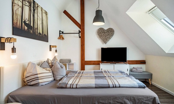 Ravensburg Apartment | Room 2, cozy, bright double room with sloping ceiling