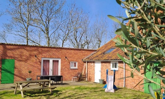 Grijpskerke House | Rurally and centrally located four-person holiday home in Grijpskerke