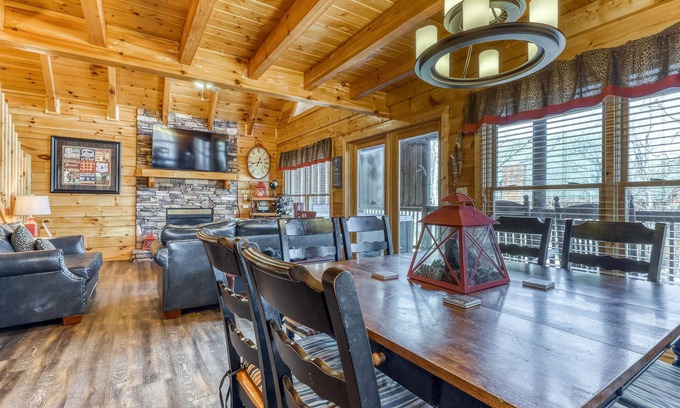Gatlinburg - Pigeon Forge Cabin | Rustic home w/private hot tub, free WiFi, full kitchen, & shared pool access