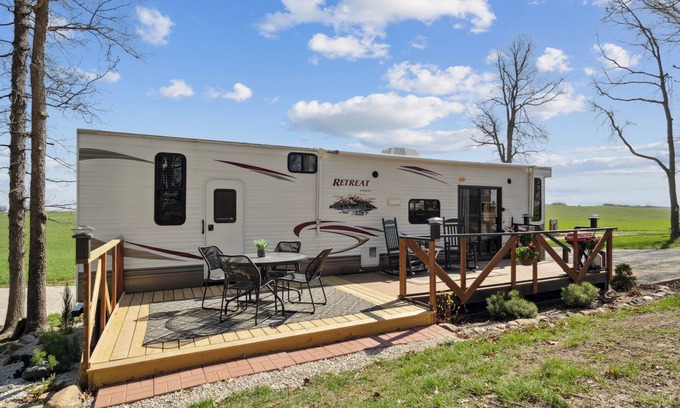 Langworthy RV Rental | Rustic Retreat Camper - on Silver Lake in Delhi. Pet Friendly!