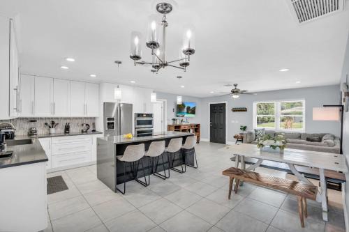 Willoughby Acres House | Salt Water Heated Pool Home with a Tiki Bar, a Garage Game Room and 4 Bikes