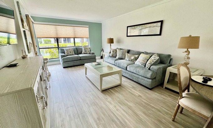 Bradenton Beach Condo | Sandy Feet Retreat Unit 108 at Runaway Bay. 1 min walk to beach.