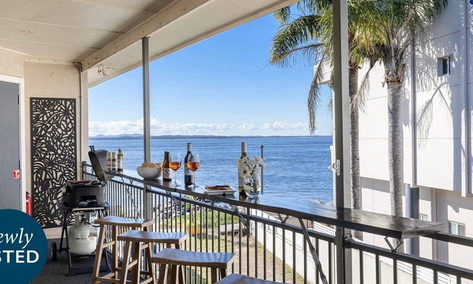 Corlette Apartment | Sandy Point Escape - waterfront apartment, walk into pristine waters, walk to beach