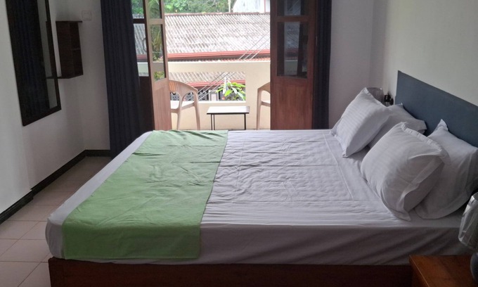 Beruwela Apartment | Sandy Steps- home stay upstairs 1 bedroom apartment with AC and WiFi