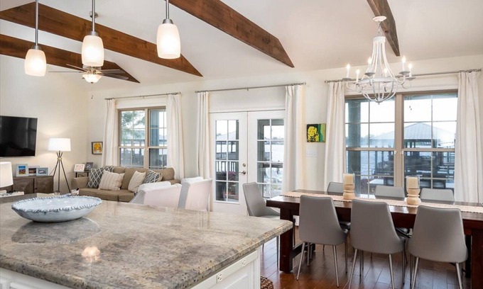 Ventress House | Screened porch and private pier on False River