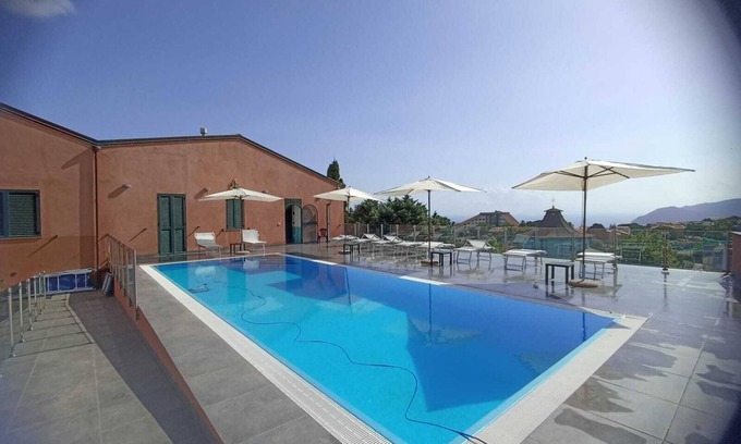 Patti Apartment | Seaside Residence with Aeolian Islands View – Pool, Gym & WiFi – Apt LIPARI