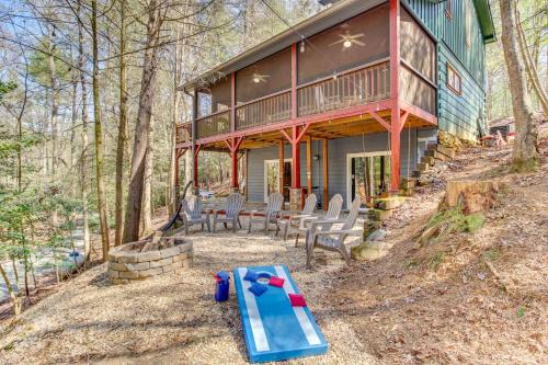 Cherry Log House | Secluded Cherry Log Cabin with Hot Tub and Swings!