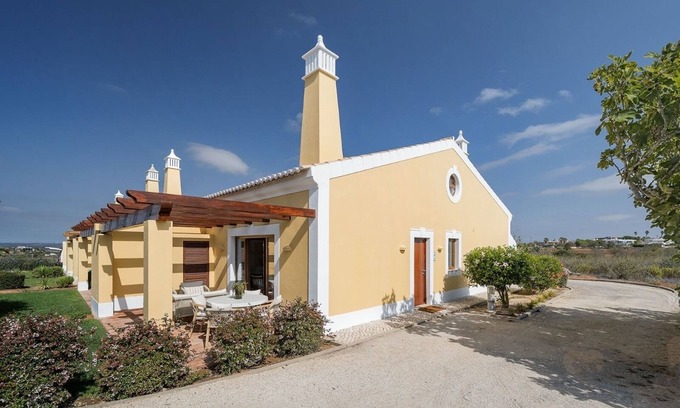Praia da Luz Villa | Serene Algarve 2 bdr Villa with Ocean-View Shared Pool in Lovely Luz near Lagos